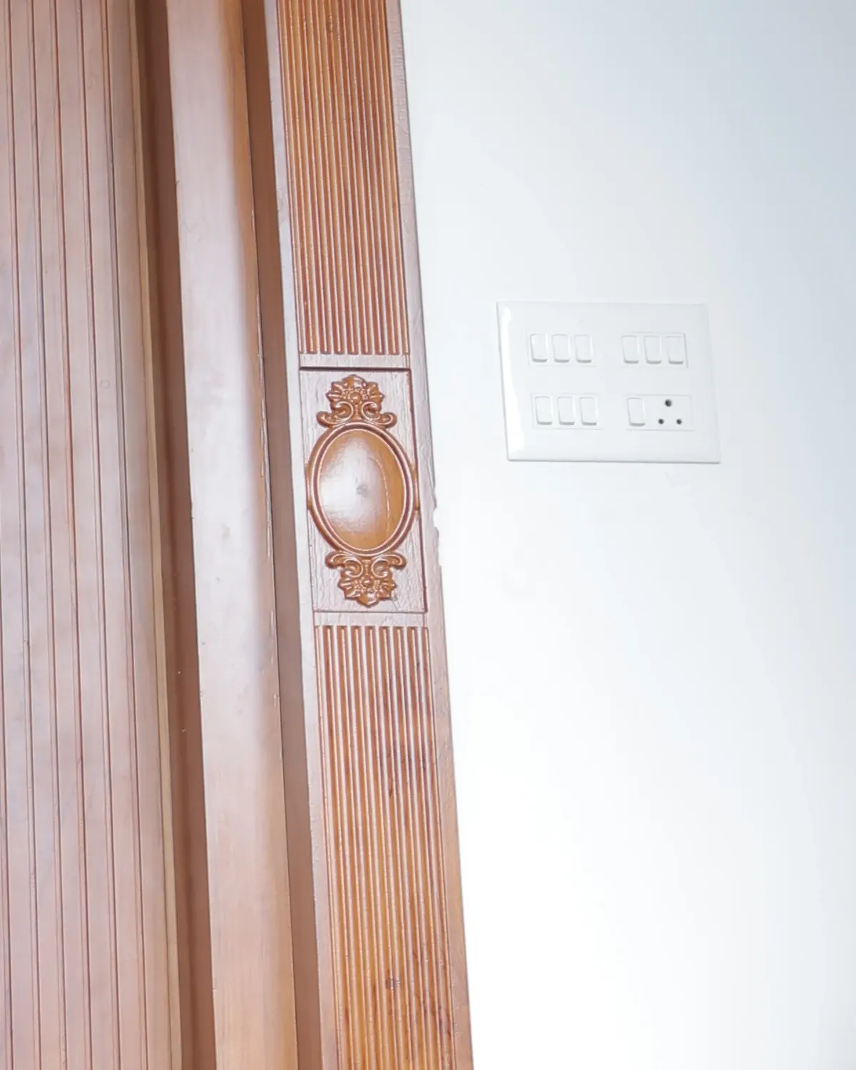 Legrand modular switchboard plate and concealed conduit wiring against finished wall — Sunil Residence